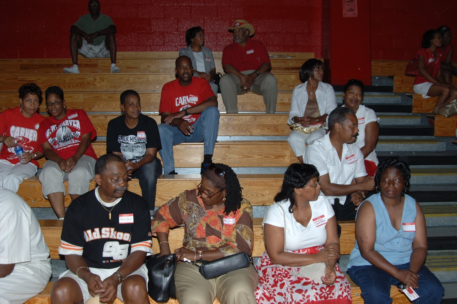 Alumni at formal banquet event on stage