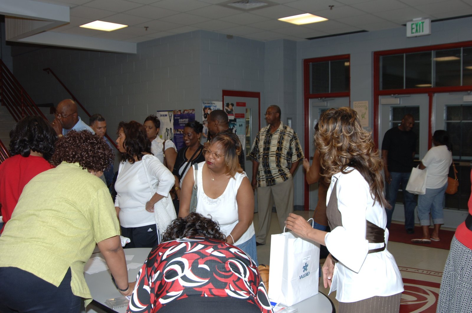Alumni gathered at school hallway event
