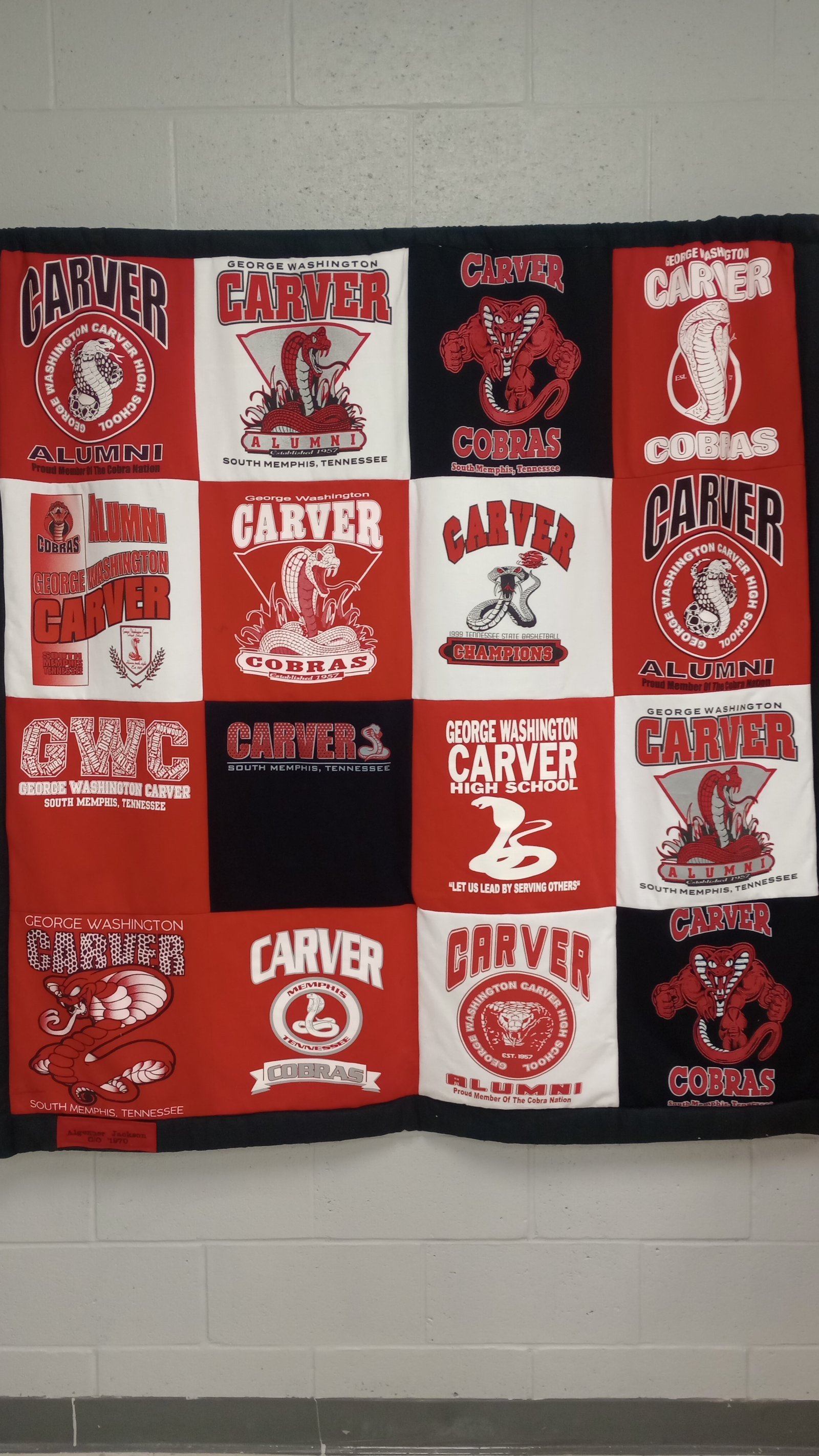 Quilt display with Carver Cobras logos