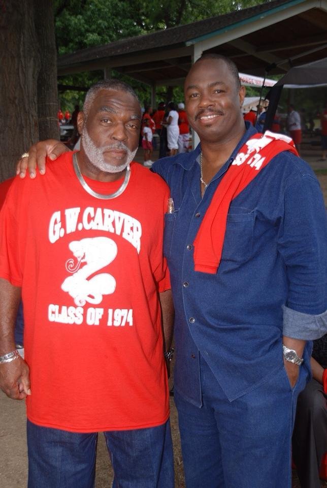 Alumni at outdoor reunion event on street