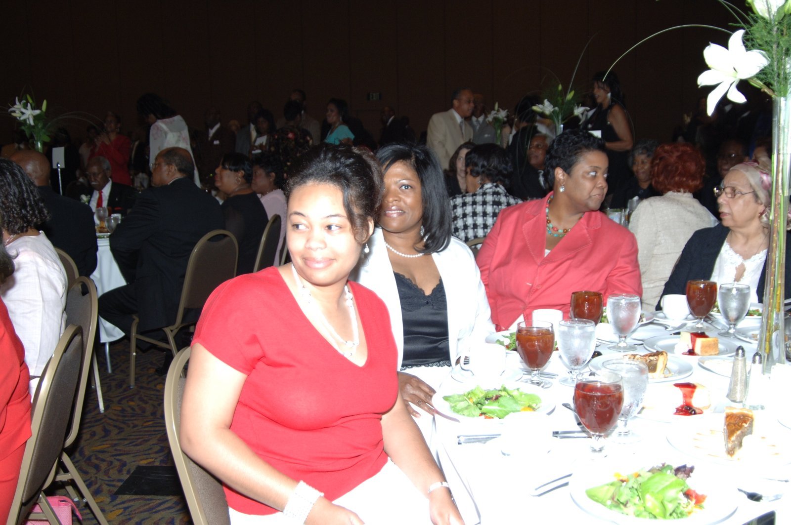 Alumni at formal event with elegant table settings