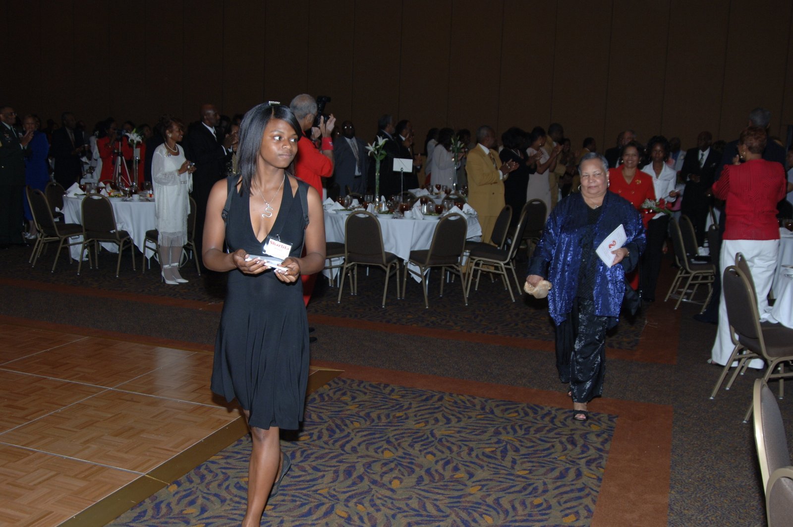 Formal banquet event with alumni in elegant attire